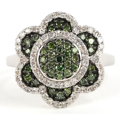 3011 - 9ct white gold green and white diamond flower head ring, size R, 5.2g.