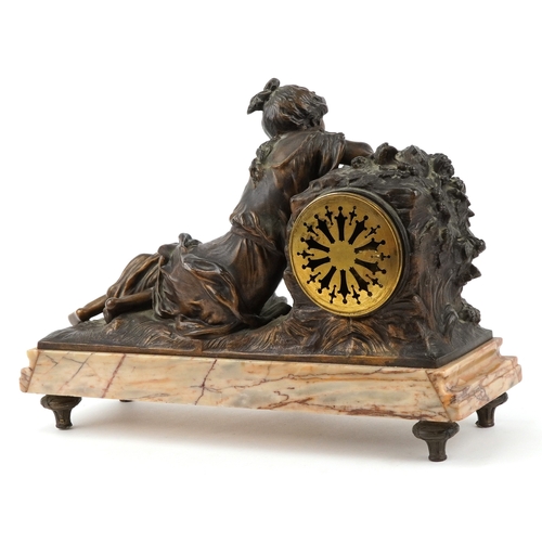75 - After Moreau, early 20th century patinated spelter mantle clock cast with a recumbent female and emb... 