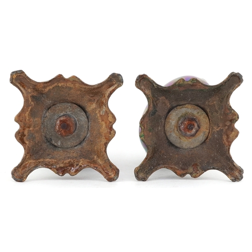 2378 - Pair of Art Nouveau pottery bud vases having a lustre glaze, raised on gilt metal bases, 19cm high.