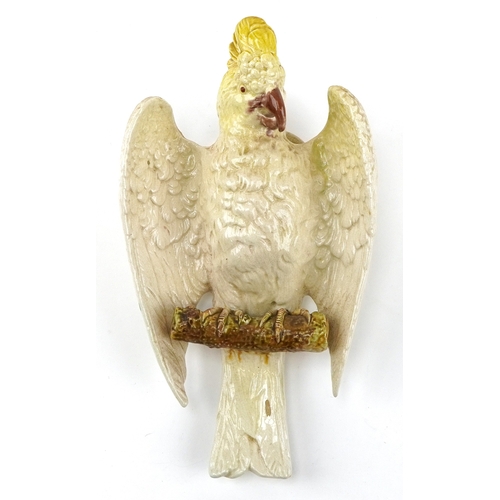 163 - Bretby pottery wall mounted cockatoo, 34cm high.