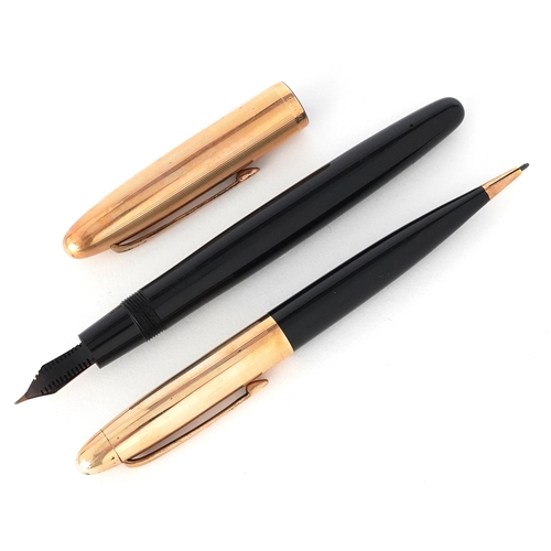 49 - Omas Extra, propelling pencil and fountain pen with 14ct gold nib, housed in a fitted box