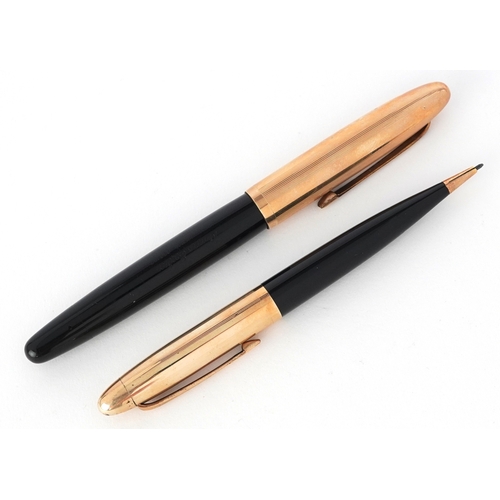 49 - Omas Extra, propelling pencil and fountain pen with 14ct gold nib, housed in a fitted box