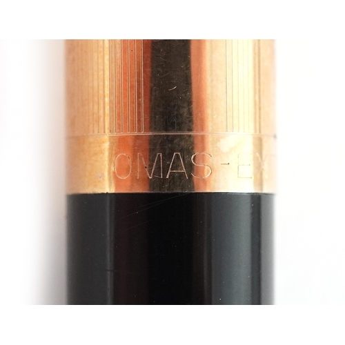 49 - Omas Extra, propelling pencil and fountain pen with 14ct gold nib, housed in a fitted box