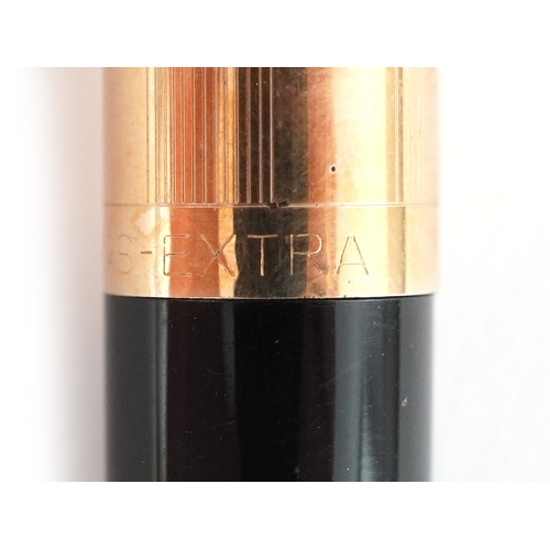 49 - Omas Extra, propelling pencil and fountain pen with 14ct gold nib, housed in a fitted box