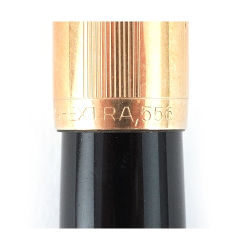 49 - Omas Extra, propelling pencil and fountain pen with 14ct gold nib, housed in a fitted box