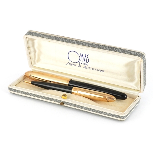 49 - Omas Extra, propelling pencil and fountain pen with 14ct gold nib, housed in a fitted box