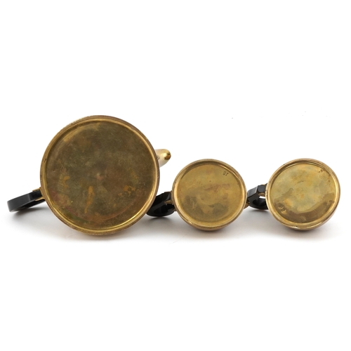 34 - Modernist three piece brass tea set with horn handles, the largest 25cm wide.