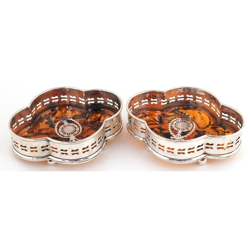 2356 - Pair of silver plated and faux tortoiseshell wine coasters raised on paw feet, 5cm H x 15cm W x 11.5... 