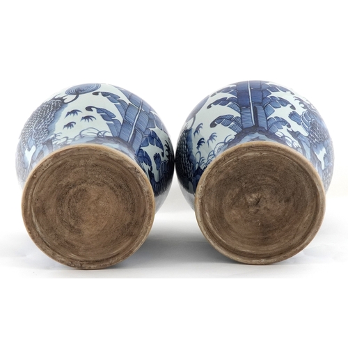278 - Large pair of Chinese blue and white porcelain baluster vases with covers, decorated with dragons, e... 