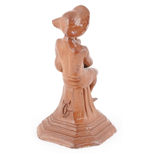 19 - George Tinworth for Royal Doulton, Merry Musicians Series pottery figure modelled as a seated boy pl... 