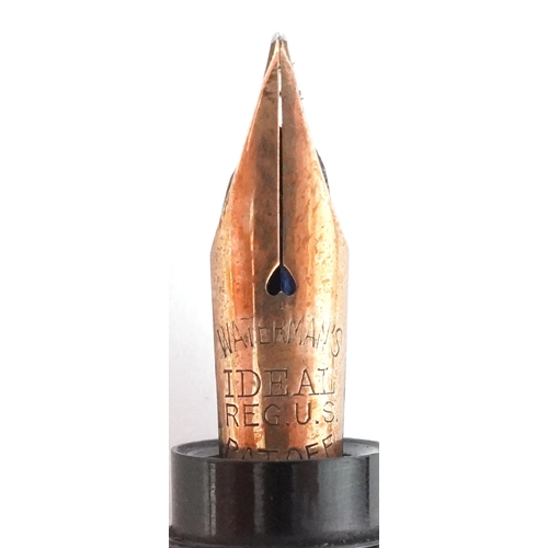 47 - Watermans Ideal 18ct gold cased fountain pen and inkwell set housed in a fitted case.
