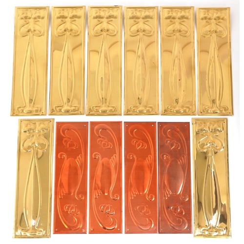 259 - Collection of Art Nouveau style copper and brass finger plates, 28cm high.