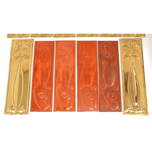 259 - Collection of Art Nouveau style copper and brass finger plates, 28cm high.