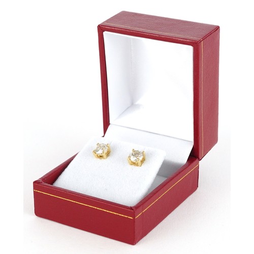 3043 - Pair of 18ct gold round brilliant cut diamond stud earrings, the diamonds 1.82 carat, 5.8mm in diame... 