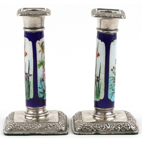  William Hutton & Sons Ltd., pair of Edwardian silver and guilloche enamel candlesticks decorated wit... 