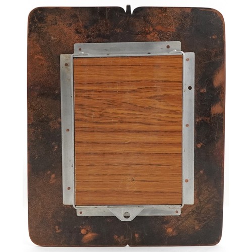 Sam Fanaroff, Arts & Crafts style copper mirror set with a lapis lazuli cabochon, 46cm x 37cm.