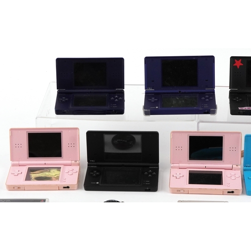 Vintage and later hand held games consoles with games and accessories ...