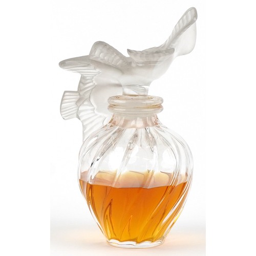  Lalique, large Nina Ricci L'Air du Temps perfume bottle, the frosted glass stopper modelled as two d... 