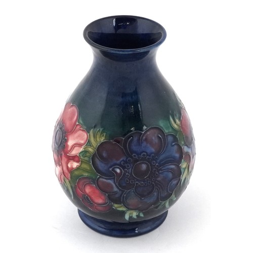  Moorcroft pottery vase hand painted in the anemone pattern, 15cm high.