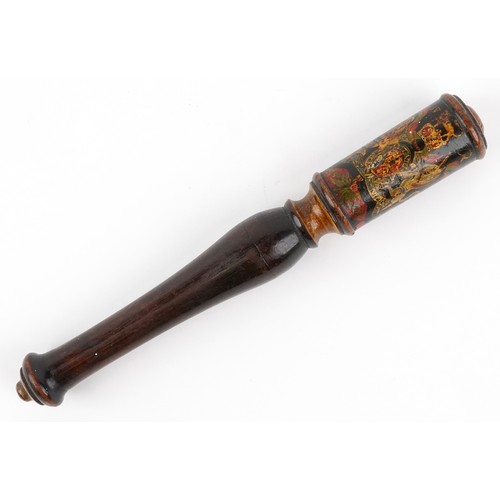  zzz S military interest truncheon hand painted with a crest, 28cm in length.