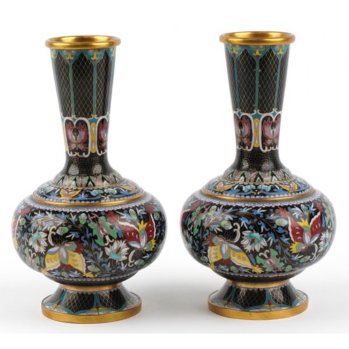  Pair of Chinese cloisonné brass vases enamelled with butterflies amongst flowers, 26cm high.