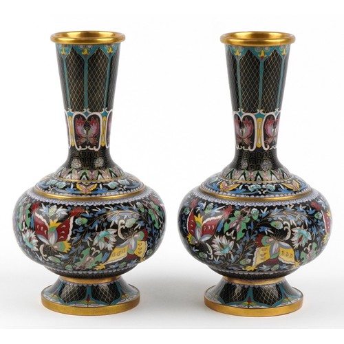  Pair of Chinese cloisonné brass vases enamelled with butterflies amongst flowers, 26cm high.