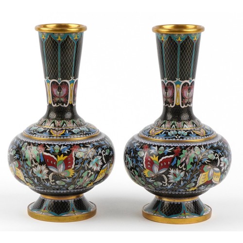  Pair of Chinese cloisonné brass vases enamelled with butterflies amongst flowers, 26cm high.