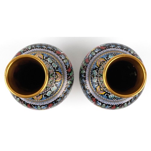  Pair of Chinese cloisonné brass vases enamelled with butterflies amongst flowers, 26cm high.