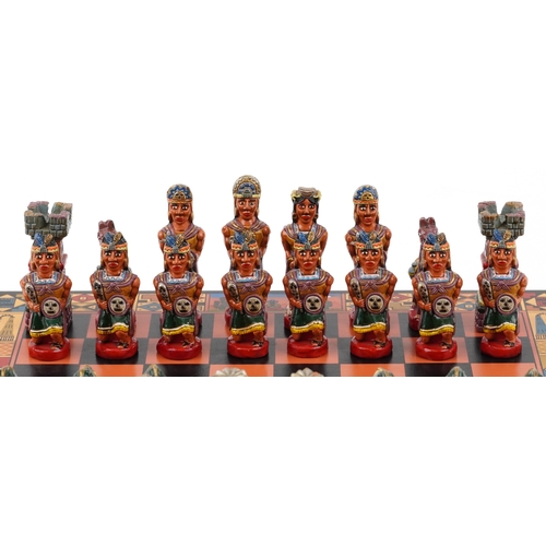  Vintage Mayan style hand painted chess set with folding chess board, the largest piece 9.5cm high, t... 