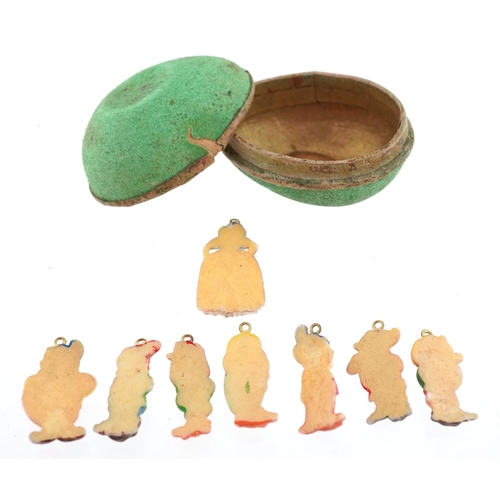  Set of 1930s film release Snow White & The Seven Dwarf painted plastic charms, the largest 3cm high.
