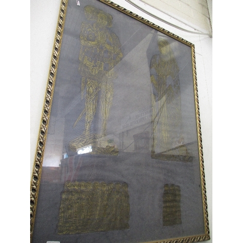 56 - FRAMED AND GLAZED BRASS RUBBING ON FABRIC