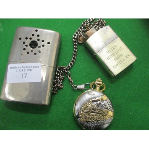 25 - POCKET WATCH AND CHAIN WITH STEAM TRAIN EMBLEM A METAL HAND WARMER PLUS VINTAGE ENGRAVED LIGHTER