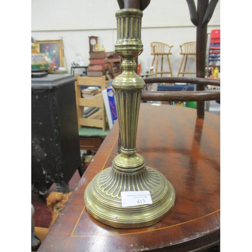 94 - A DECORATIVE BRASS CANDLE STICK