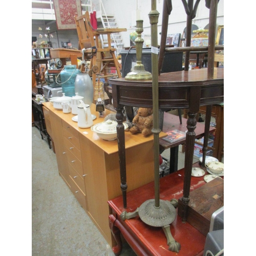 97 - A VINTAGE BRASS STANDARD LAMP WITH DECORATIVE BASE ON 3 LEGS