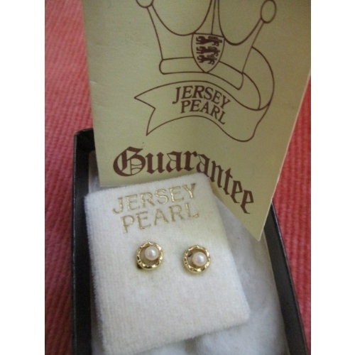 14 - A PAIR OF GOLD COLOURED JERSEY PEARL STUD EARRINGS WITH CARE INSTRUCTIONS INCLUDED