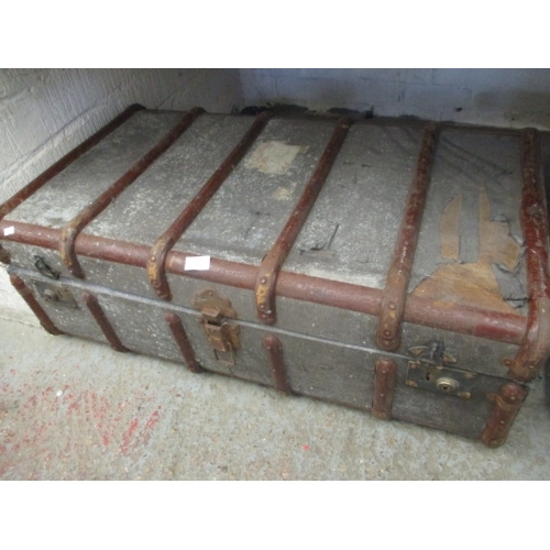 151 - LARGE STEAMER TRUNK WITH WOODEN BANDING