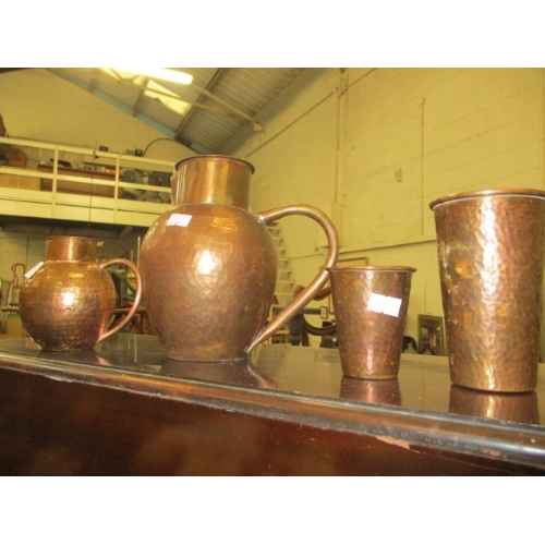 232 - 2 COPPER BEAKERS AND 2 COPPER JUGS