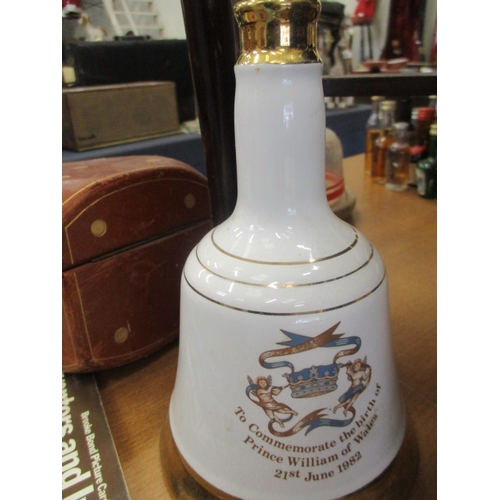 235 - COMMEMORATIVE BELLS WHISKY DECANTER   QUEEN MOTHERS 90TH,  EMPTY PRINCE WILLIAM DECANTER