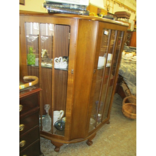 422 - BOW DISLAY CABINET IN WALNUT  WITH 2 GLASS PANELLED DOORS AND KEY