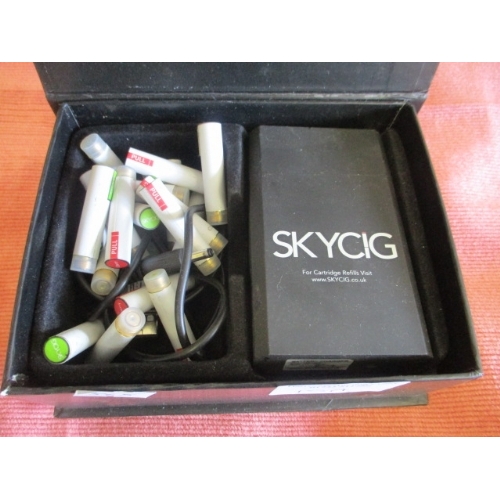 15A - A SKYCIG VIP SMOKING AID WITH A NUMBER OF REFILLS