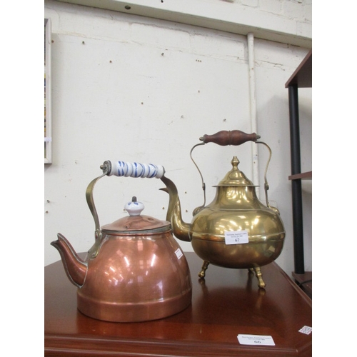 67 - BRASS KETTLE ON FEET AND COPPER KETTLE WITH DELFT HANDLE