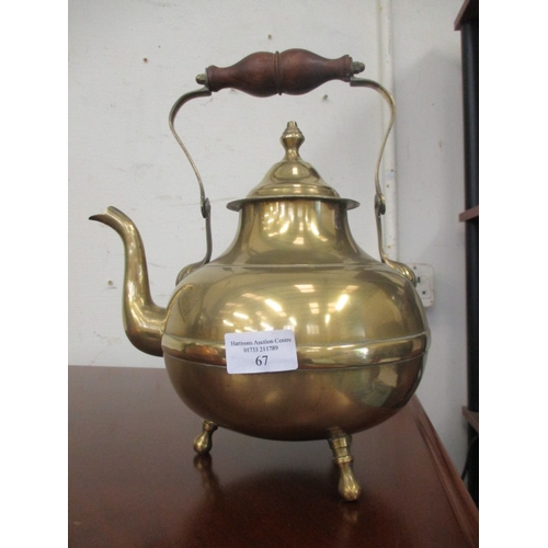 67 - BRASS KETTLE ON FEET AND COPPER KETTLE WITH DELFT HANDLE