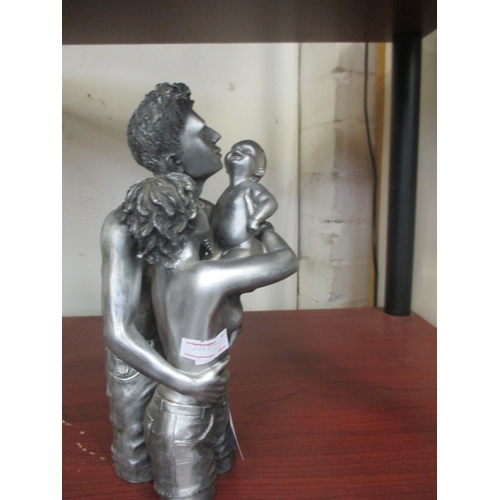 80 - FATHER, MOTHER AND BABY FIGURE IN SILVER COLOUR