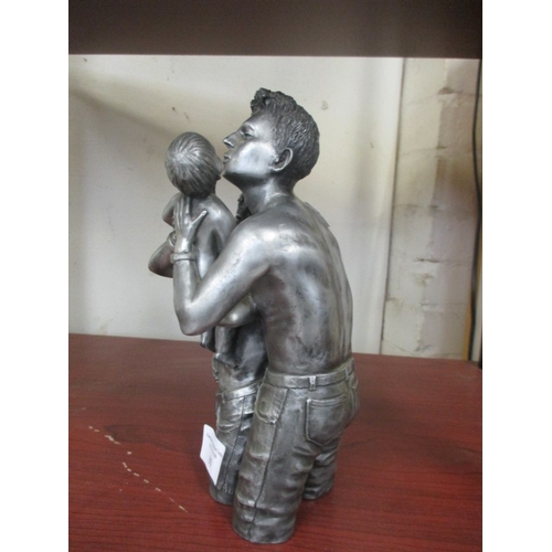 80 - FATHER, MOTHER AND BABY FIGURE IN SILVER COLOUR