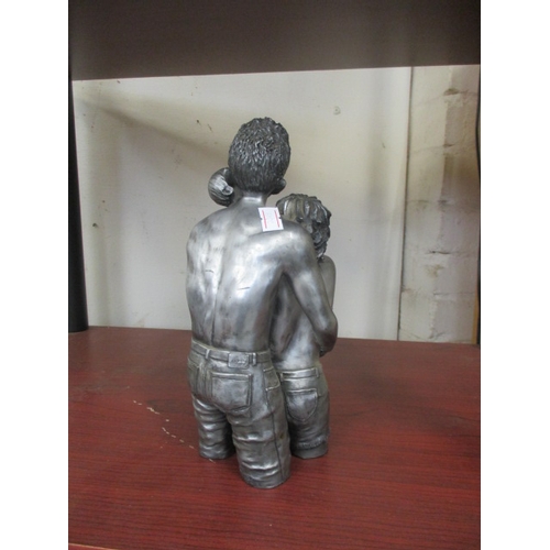 80 - FATHER, MOTHER AND BABY FIGURE IN SILVER COLOUR