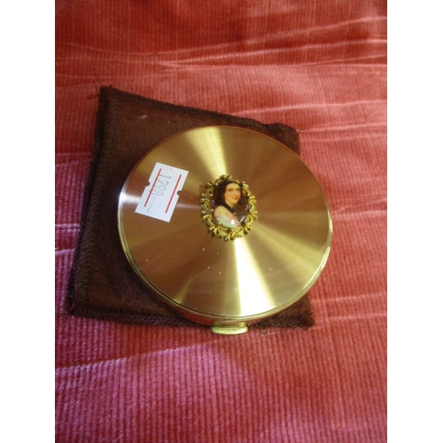 31 - GOLD COLOURED COMPACT WITH CAMEO BY HILCA MADE IN SWITZERLAND