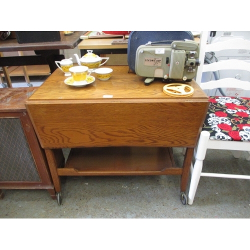 385 - WOOD DROP LEAF TABLE WITH SHELF UNDER ON CASTERS