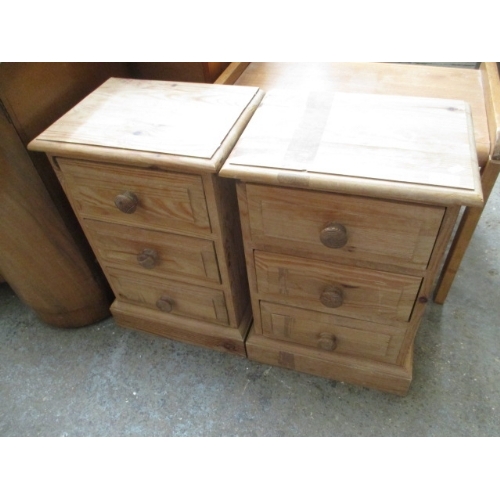 390 - A PAIR OF PINE 3 DRAWER BEDSIDE CHESTS