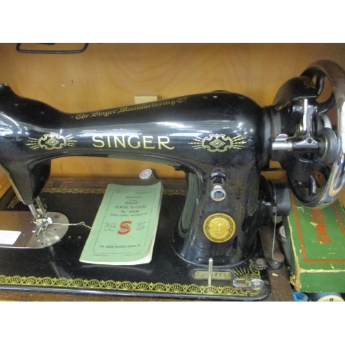 110 - VINTAGE SINGER SEWING MACHINE  EJ007754 WITH  INSTRUCTION BOOK PLYS BOBBINS AND ACCESSORY BOX
LOVELY... 