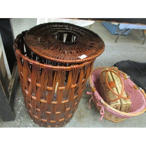 214 - WICKER LAUNDRY BASKET, WICKER HANDBAG AND ONE OTHER BASKET WITH HANDLES